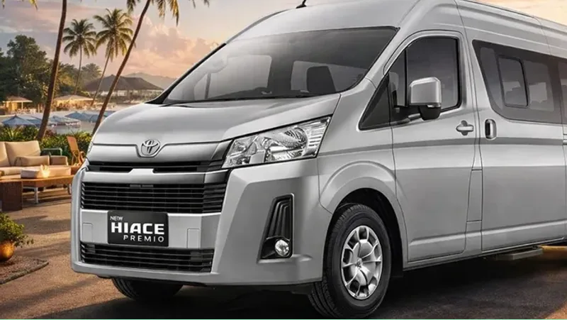 Interior armada Toyota Hiace travel Tangerang ke Lampung - kabin full AC dan reclining seat